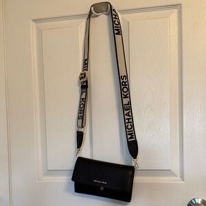 Michael Kors Black Pebbled Leather Crossbody with White Branded Strap